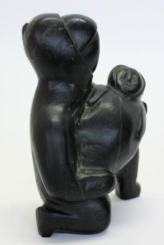 Kneeling Woman Holding a Child by 
																			Margaret Uyauperq Aniksak