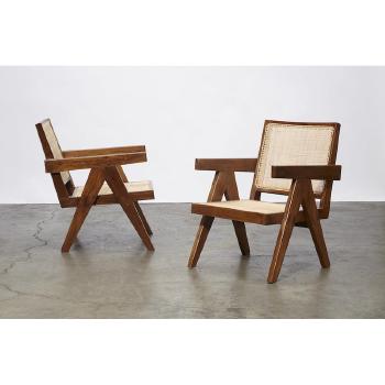 Pair of easy armchairs by 
																			Pierre Jeanneret