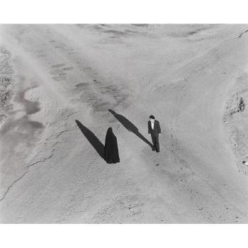Couple at Intersection, from Fervor series by 
																			Shirin Neshat