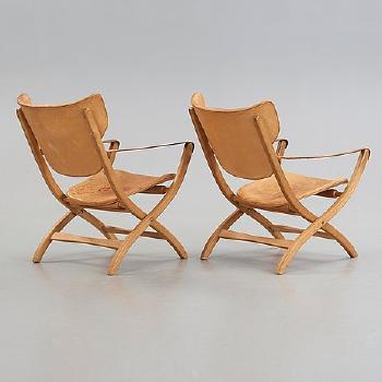 A Pair of Egyptian Folding Chairs by 
																			Poul Hundevad