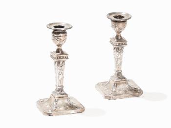 Pair of silver candlesticks by 
																			 Walter Latham & Son