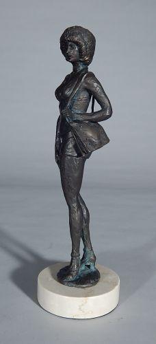 Standing woman by 
																			Siggy Puchta