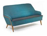 A suite of furniture comprising a settee and an armchair by 
																			Bertil Fridhagen