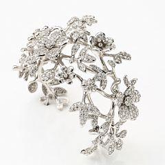 A Flowers diamond bangle by 
																			Ole Lynggaard