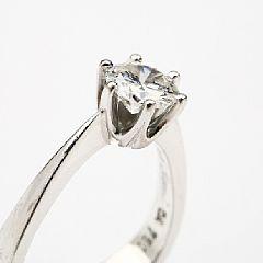 A diamond solitaire ring by 
																			 C Antonsen