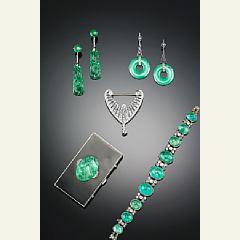 A emerald and diamond bracelet set by 
																			 Hancocks & Co.