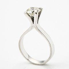 A diamond solitaire ring set by 
																			 Halberstadt Co.