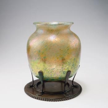 Vase with bronze foot by 
																			Louis Comfort Tiffany