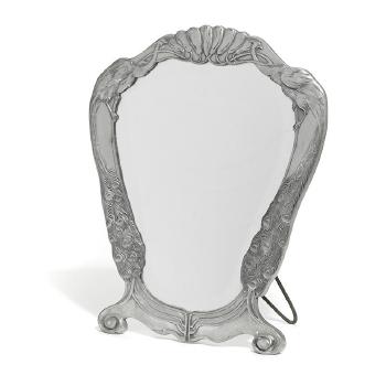 A peacock mirror by 
																	 Osiris - Walter Scherf & Co