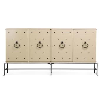 Studded cabinet by 
																			Tommi Parzinger