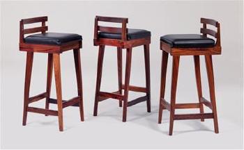 Three bar stools by 
																	 Dyrlund