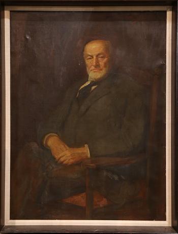 Portrait of a seated gentleman by 
																	Maurice Fromkes
