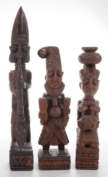Female fertility figure; Musician playing a horn; Musician with beard and elaborate headdress playing percussion instruments by 
																			Lamidi Fakeye