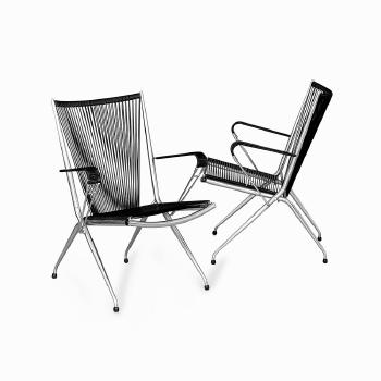 Pair of Folding Chrome Armchairs by 
																			Andre Monpoix