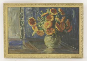 A still life of a jug of sunflowers by 
																			Stella Mynors