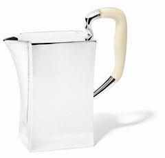 A water pitcher with ivory handle by 
																	 Hans Hansen Silver