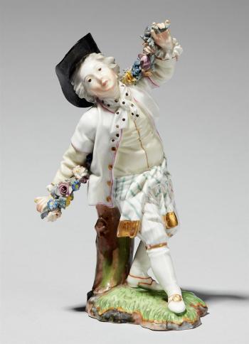 A Höchst model of a dancer with a garland by 
																	 Hochst Porcelain