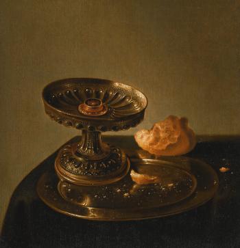 A Still Life of a Silver Tazza and a Bread Roll on a Pewter Plate by 
																	Jan Jansz den Uyl