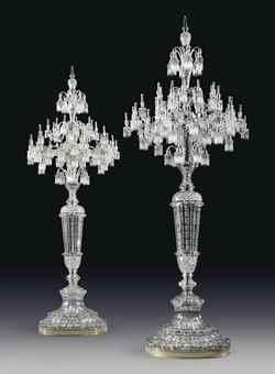 A monumental pair of candelabras by 
																	 Baccarat