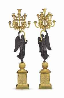A pair of empire twelve-light candelabra by 
																	Charles Percier