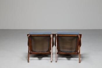 Two chairs by 
																			Enrico Ciuti