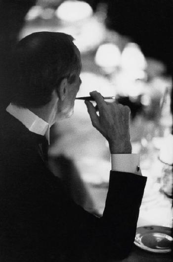 Portrait d’un inconnu lors d’un dîner chez Maxim’s pour fêter le succès de la pièce de Bernard Slade, 'La fille sur la banquette arrière'. Février 1983 by 
																	Benoit Gysembergh