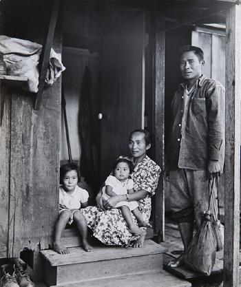 Family in Japanese Internment Camp by 
																			Eliot Elisofon