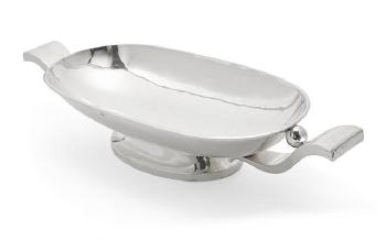 Footed two-handle centerbowl by 
																	Margot de Taxco