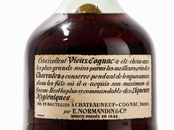 One bottle of Extra Cognac Fine Champagne by 
																			 E Normandin