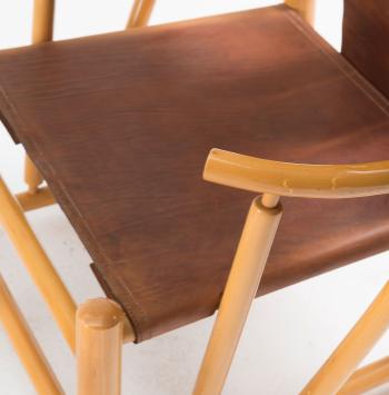 Two 'G23' armchairs and a side table by 
																			Werther Toffoloni