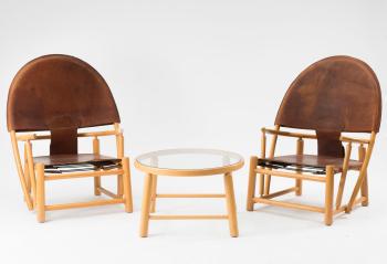 Two 'G23' armchairs and a side table by 
																			Werther Toffoloni