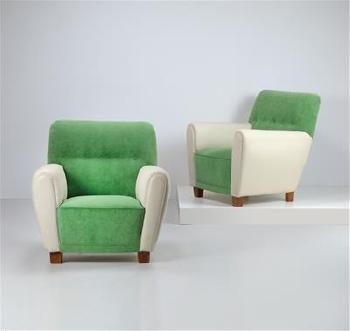 A pair of armchairs by 
																	Oswald Haerdtl