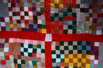 Big cross with postage stamps quilt by 
																			Louella Pettway