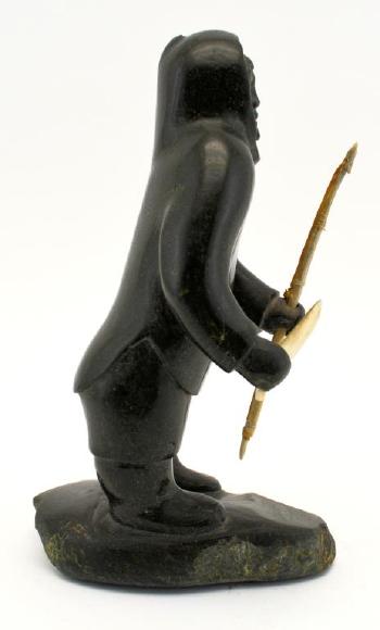 Standing hunter with spear and knife by 
																			George Aggiaq