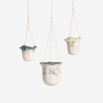 Hanging pots by 
																			Nancy Jurs