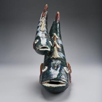 Skulptur i form av fiskar by 
																			Taisto Kaasinen