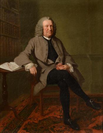 Portrait of a naturalist seated at his desk, wearing a brown coat, black breeches and holding a geological specimen by 
																			Johann Zoffany