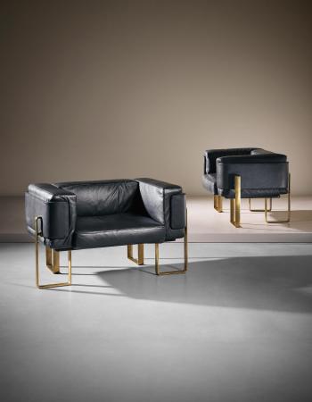 Pair of 'Polar' lounge chairs by 
																	Esko Pajamies