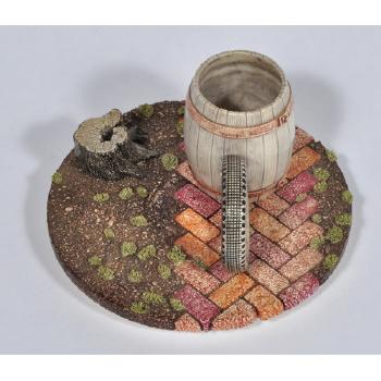 Tire, a ceramic teacup and saucer by 
																			Richard Notkin