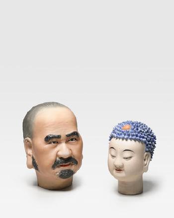 Two heads by 
																	 Zeng Longsheng