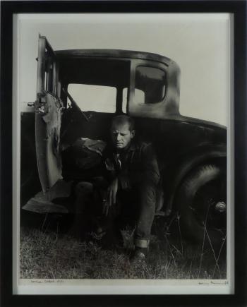 Jackson Pollock resting by an old car by 
																			Hans Namuth