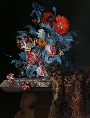 A still life with flowers in a silver vase and a folded rug by 
																			Hendrik de Fromantiou