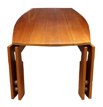 Dining table by 
																			John H Dodd