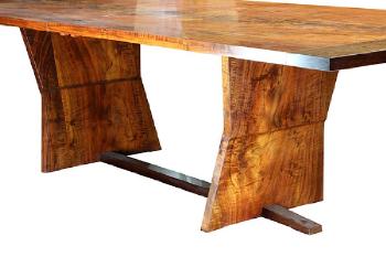 Claro walnut dining table by 
																			Enzo Bellini