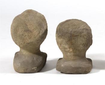 Busts of a man and a woman by 
																			Silvio Zoratti