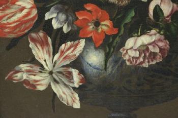 Floral Still life of tulips, roses, carnations, chrysanthemums and daffodils in a blue and white ceramic vase, upon a stone plinth by 
																			Francesco Mantovano