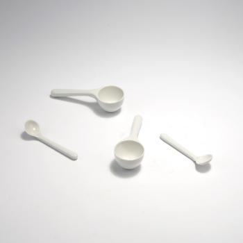 Two 'Belle' eggcups with 'Bon' spoons by 
																			Konstantin Grcic