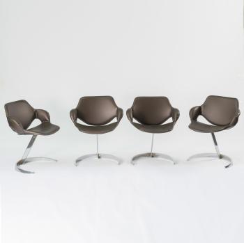 Four 'Scimitar' armchairs by 
																			Boris Tabakoff