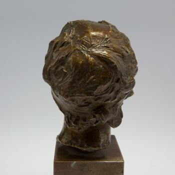 Female head by 
																			Josef Vaclav Myslbek