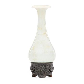 Miniature vase on elaborately carved and pierced stand by 
																			 University City Pottery